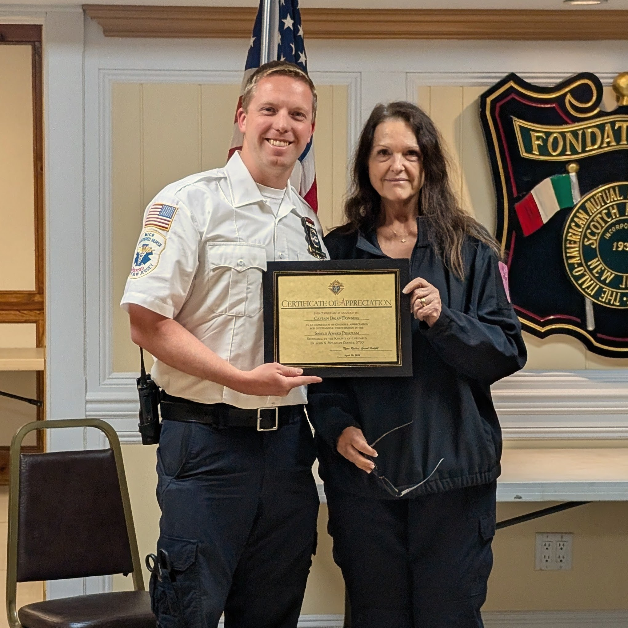 Cpt. Brian Downing with President Patty Buckridee