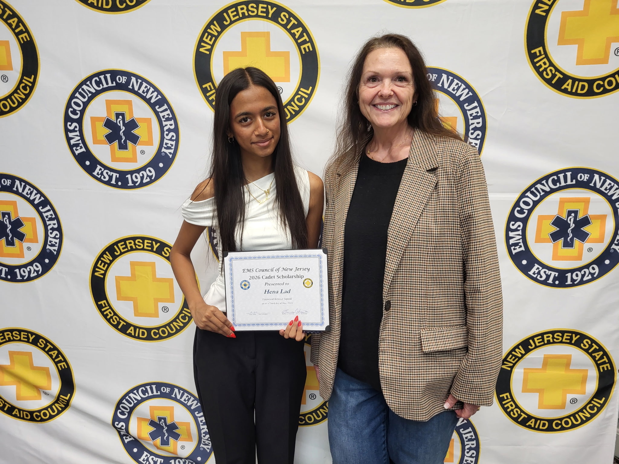 Probationary EMT Hena Lad with President Patty Buckridee